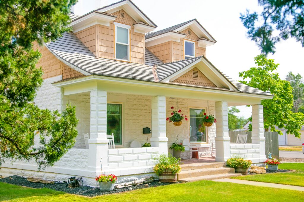 cheerful house in summer with a front porch