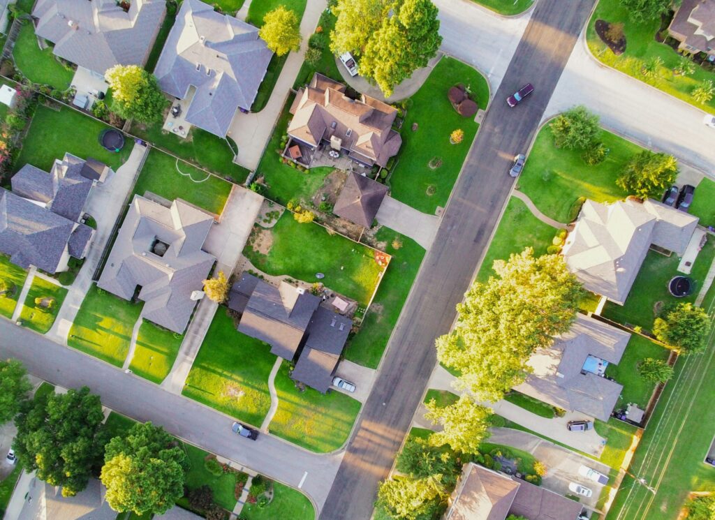 overhead photography of a lush, green suburban neighborhood