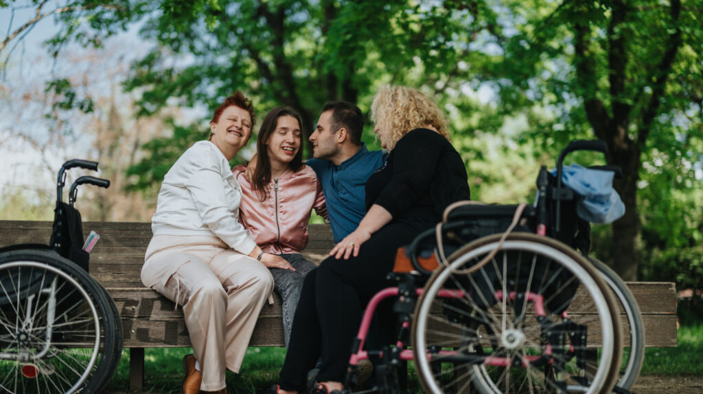 Disabled people with I/DD gather in a park